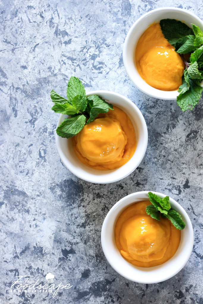 This creamy delicious No-Churn Mango Sorbet Recipe is made without an ice-cream maker, and yet is one of the most amazing Frozen Dessert Recipes. Perfect easy summer dessert Mango Sorbet. 5 ingredient Mango Sorbet. Healthy Mango Sorbet Recipes. No-Churn Ice Cream Recipe