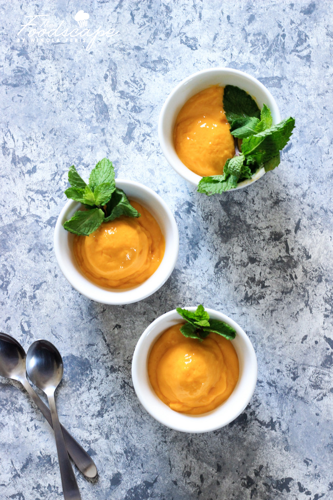 This creamy delicious No-Churn Mango Sorbet Recipe is made without an ice-cream maker, and yet is one of the most amazing Frozen Dessert Recipes. Perfect easy summer dessert Mango Sorbet. 5 ingredient Mango Sorbet. Healthy Mango Sorbet Recipes. No-Churn Ice Cream Recipe